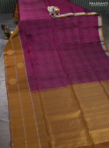 Kanchipuram soft silk saree magenta pink and mustard yellow with allover silver & gold zari weaves and long zari woven butta border