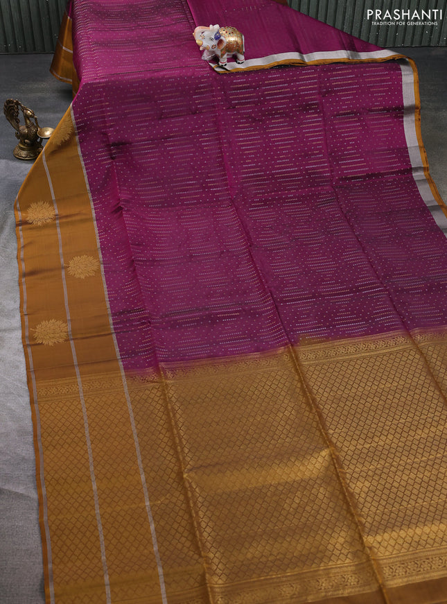 Kanchipuram soft silk saree magenta pink and mustard yellow with allover silver & gold zari weaves and long zari woven butta border