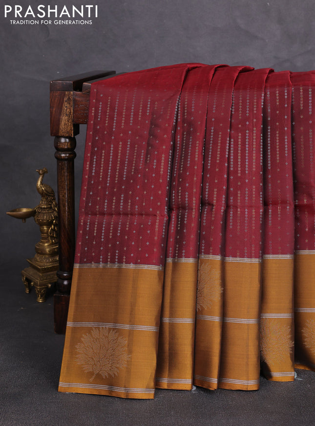 Kanchipuram soft silk saree deep maroon and dark mustard with allover silver & gold zari weaves and long zari woven butta border