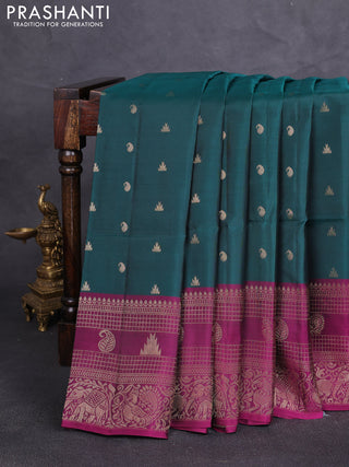 Kanchipuram soft silk saree peacock green and magenta pink with allover zari woven buttas and long zari woven border