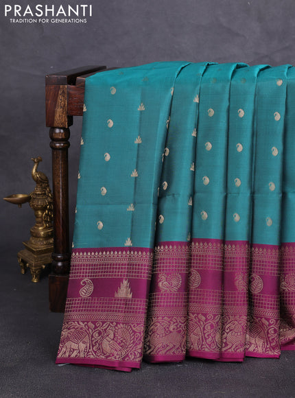 Kanchipuram soft silk saree peacock green and magenta pink with allover zari woven buttas and long zari woven border