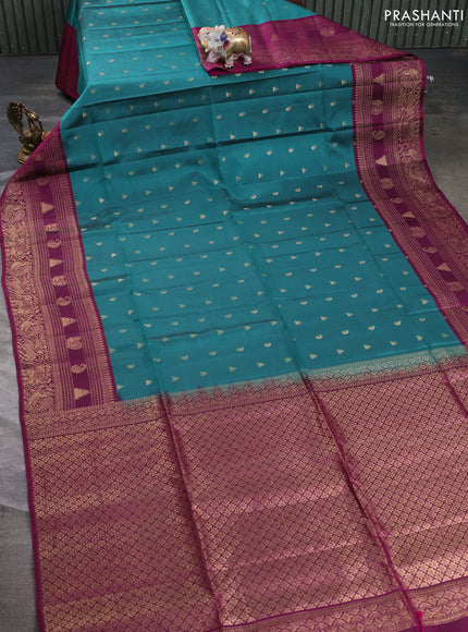 Kanchipuram soft silk saree peacock green and magenta pink with allover zari woven buttas and long zari woven border