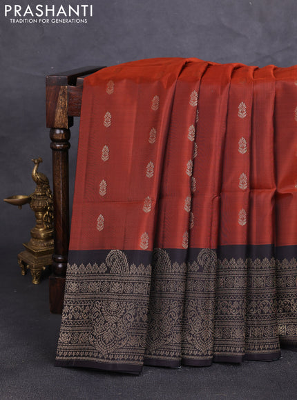 Kanchipuram soft silk saree rust shade and coffee brown with allover zari woven buttas and long zari woven border
