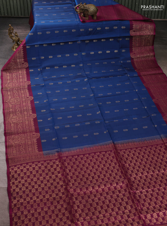 Kanchipuram soft silk saree peacock blue and magenta pink with allover zari woven buttas and long zari woven border