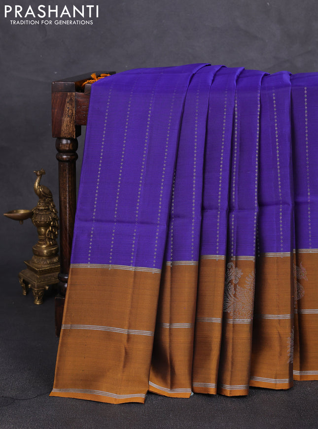 Kanchipuram soft silk saree blue and mustard yellow with allover silver zari weaves and long zari woven butta border