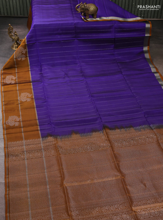 Kanchipuram soft silk saree blue and mustard yellow with allover silver zari weaves and long zari woven butta border