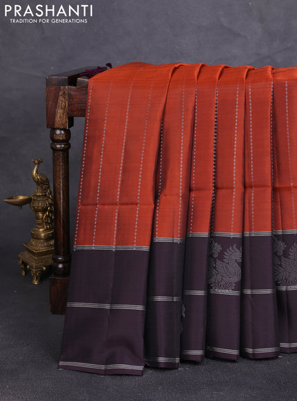 Kanchipuram soft silk saree rust shade and wine shade with allover silver zari weaves and long zari woven butta border