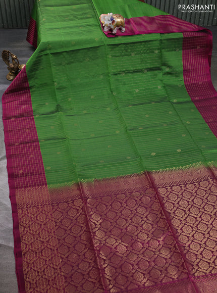Kanchipuram soft silk saree green and magenta pink with allover zari weaves & buttas and zari woven butta border
