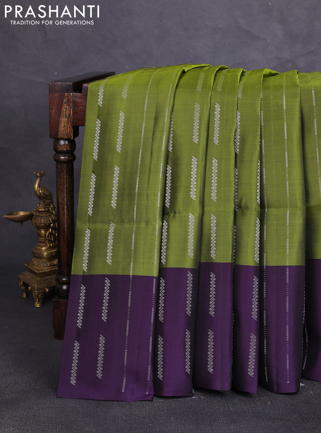 Kanchipuram soft silk saree green and deep violet with allover silver zari weaves and zari woven border