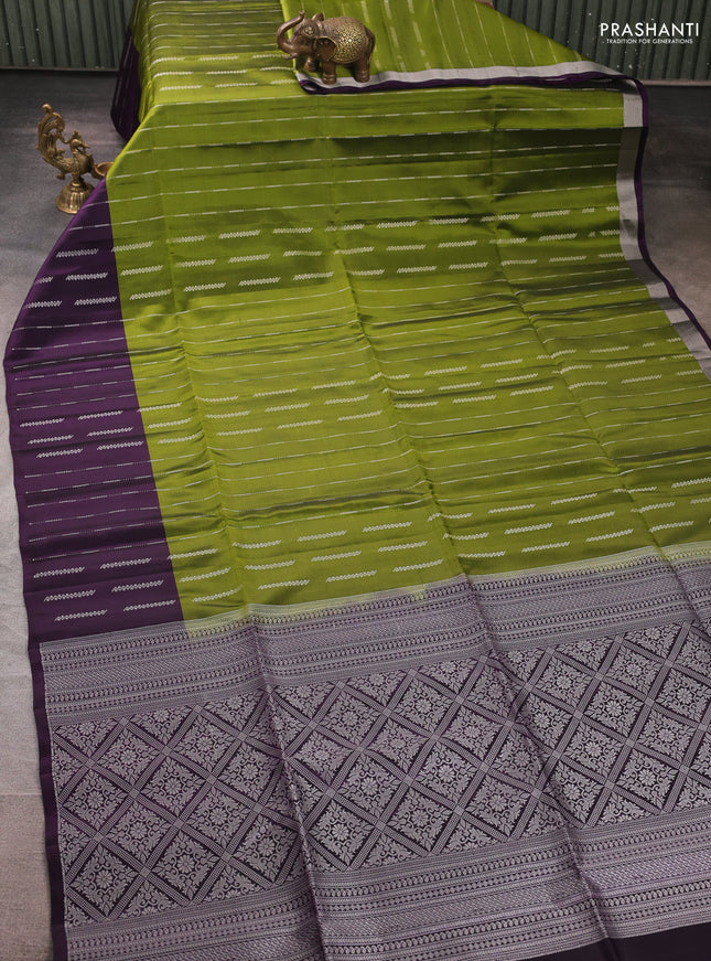Kanchipuram soft silk saree green and deep violet with allover silver zari weaves and zari woven border