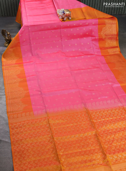 Kanchipuram soft silk saree peach pink and sunset orange with allover zari woven buttas and long zari woven border