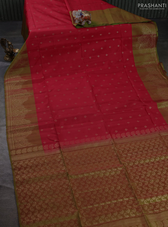 Kanchipuram soft silk saree tomato pink and light green with allover zari woven buttas and long zari woven border