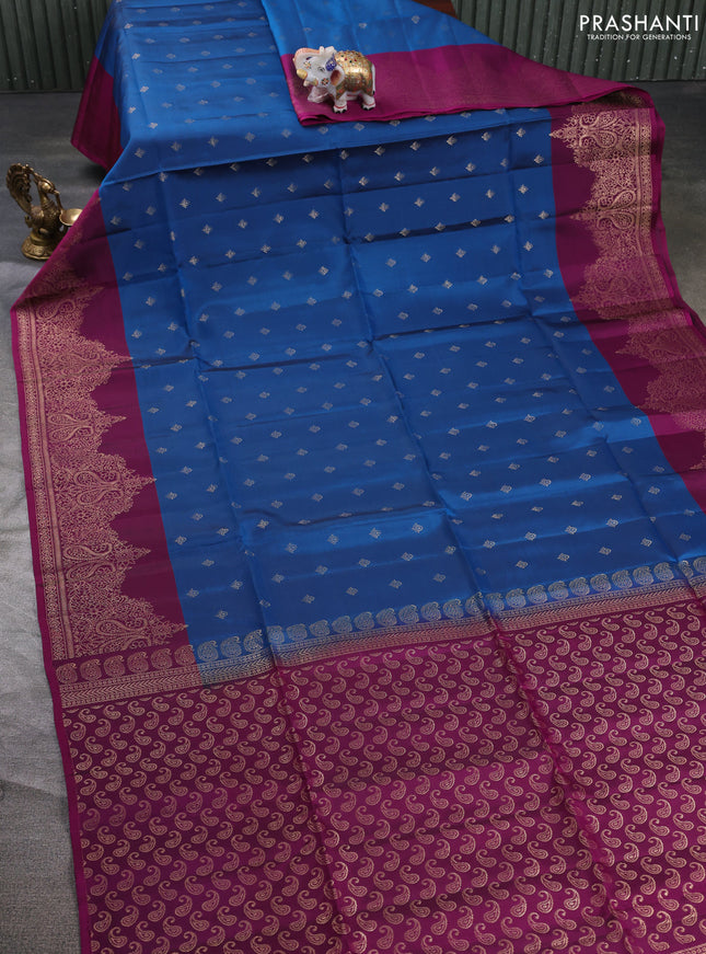 Kanchipuram soft silk saree peacock blue and magenta pink with allover zari woven buttas and zari wovenn border