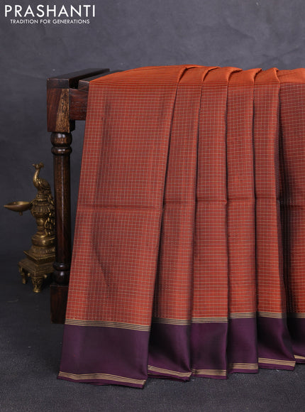 Kanchipuram soft silk saree rustic orange and deep wine shade with allover small zari checked pattern and rettapet zari woven border