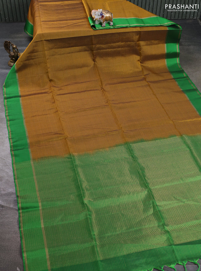 Kanchipuram soft silk saree mustard yellow and green with allover small zari checked pattern and rettapet zari woven border