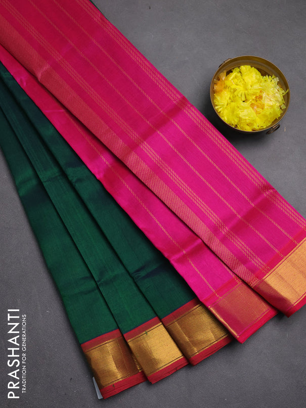 Silk cotton saree dual shade of peacock green and pink with zari woven floral buttas and zari woven border