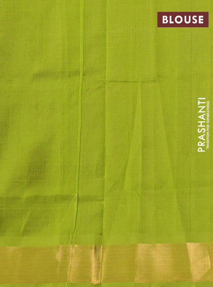 Silk cotton saree purple and light green with zari woven buttas and zari woven border