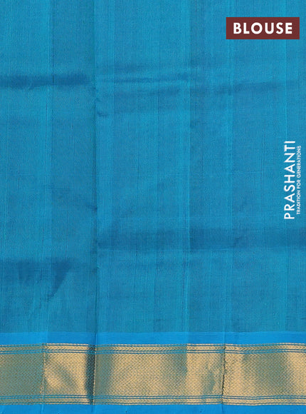 Silk cotton saree purple and teal blue with zari woven buttas and zari woven border