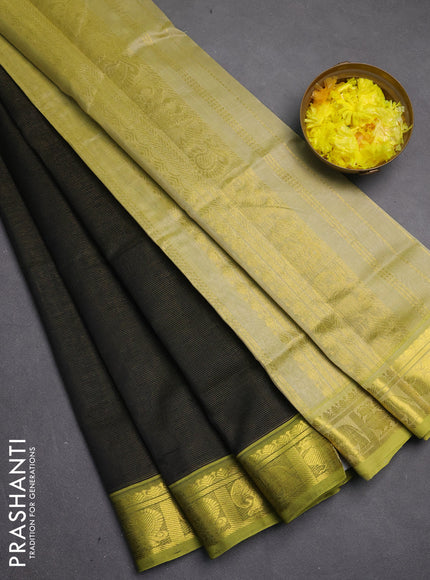 Silk cotton saree black and pista green with allover vairosi pattern and zari woven border