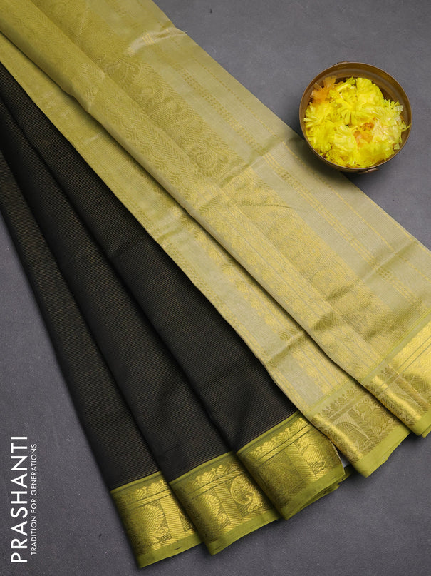 Silk cotton saree black and pista green with allover vairosi pattern and zari woven border