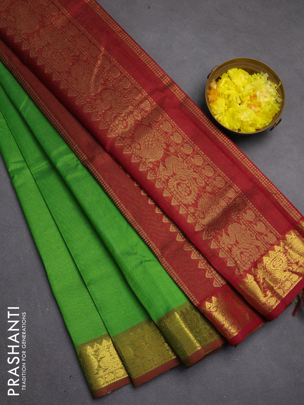 Silk cotton saree green and maroon with allover vairosi pattern and zari woven border