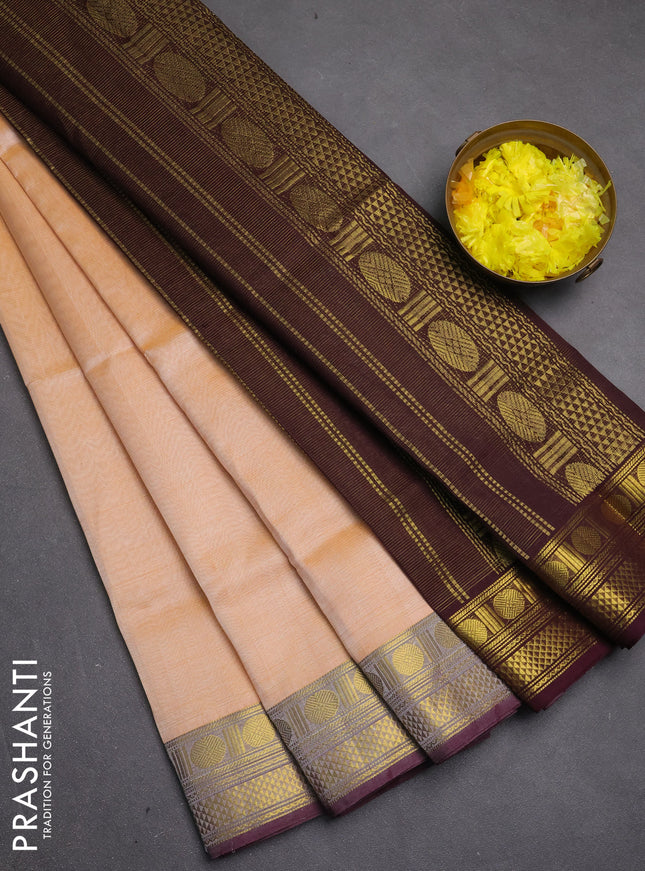 Silk cotton saree sandal and deep wine shade with allover vairosi pattern and zari woven border