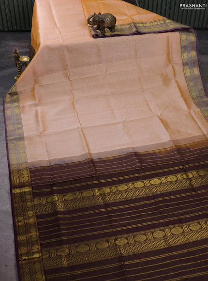 Silk cotton saree sandal and deep wine shade with allover vairosi pattern and zari woven border