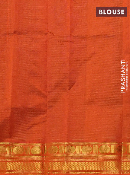 Silk cotton saree blue and orange with allover vairosi pattern and zari woven border