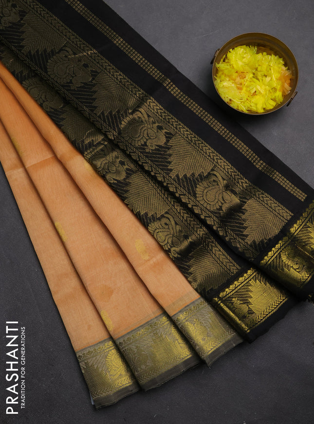 Silk cotton saree pale orange and black with zari woven buttas and annam & temple zari woven border