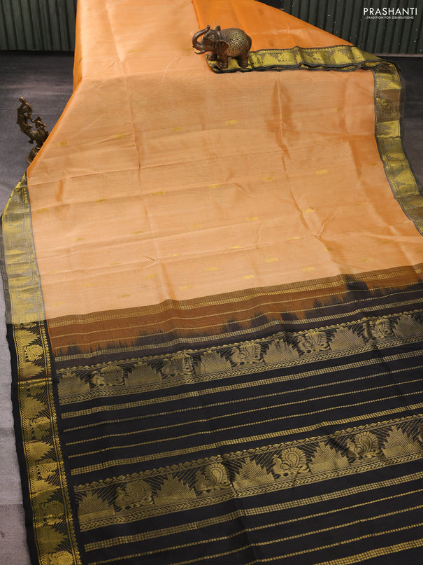 Silk cotton saree pale orange and black with zari woven buttas and annam & temple zari woven border