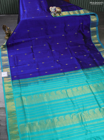 Silk cotton saree blue and teal green shade with temple zari woven buttas and paisley zari woven border