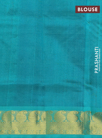 Silk cotton saree blue and teal green shade with temple zari woven buttas and paisley zari woven border