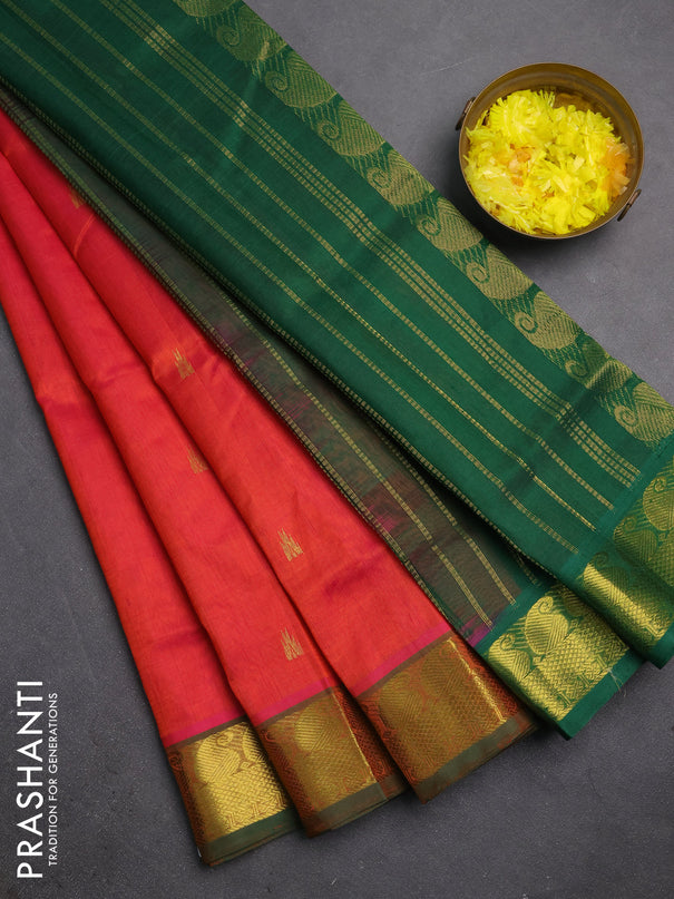 Silk cotton saree dual shade of pinkish orange and green with temple zari woven buttas and paisley zari woven border