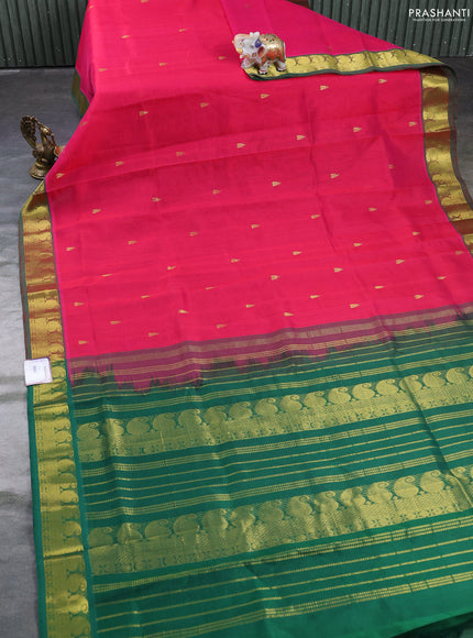 Silk cotton saree pink and green with temple zari woven buttas and paisley zari woven border