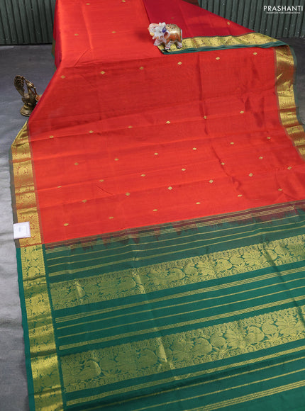 Silk cotton saree rustic orange and green with zari woven buttas and zari woven border