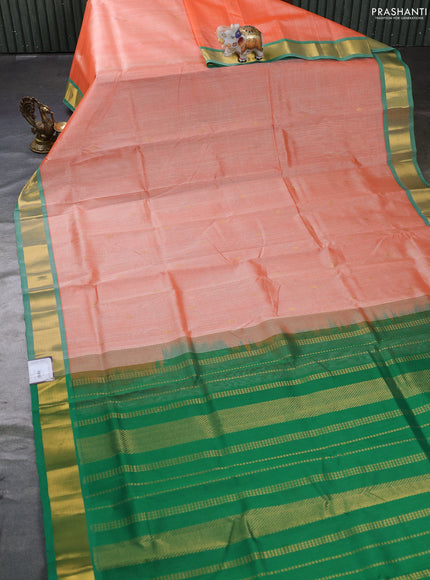 Silk cotton saree peach orange and green with zari woven buttas and zari woven border