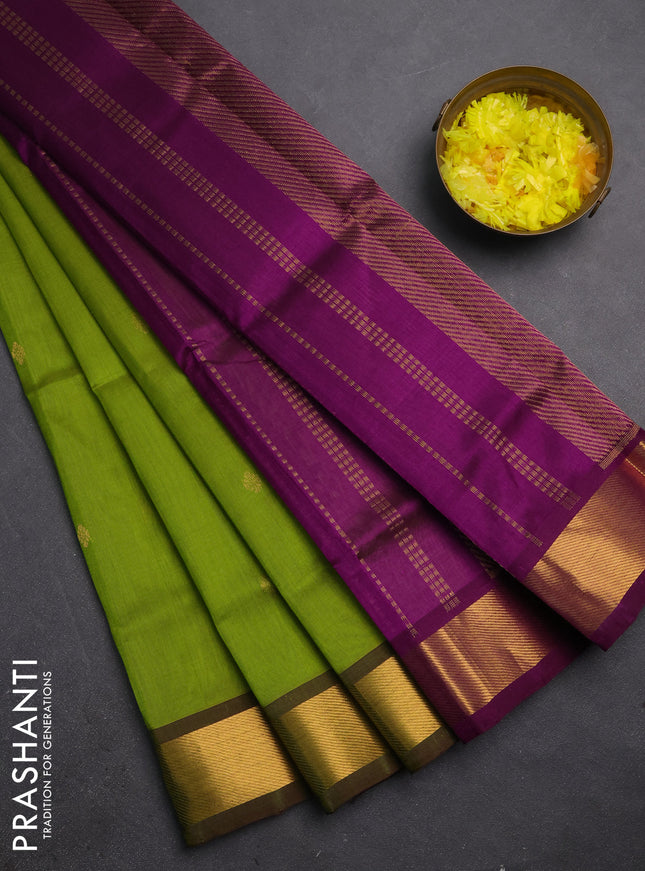 Silk cotton saree light green and purple with zari woven buttas and zari woven border