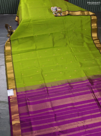 Silk cotton saree light green and purple with zari woven buttas and zari woven border