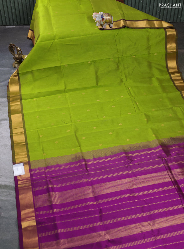 Silk cotton saree light green and purple with zari woven buttas and zari woven border