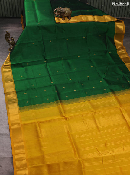 Silk cotton saree green and mustard yellow with zari woven buttas and zari woven border