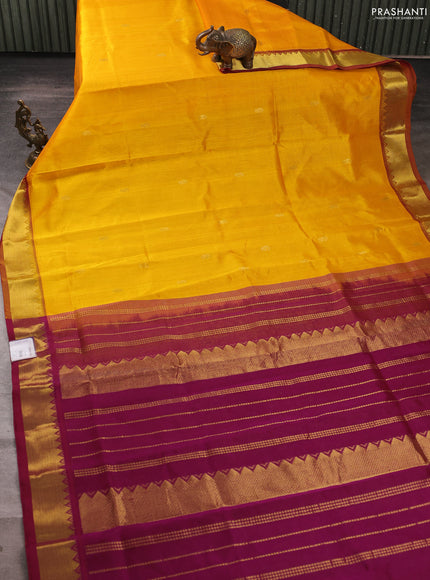 Silk cotton saree mango yellow and dark magenta pink with zari woven buttas and zari woven border