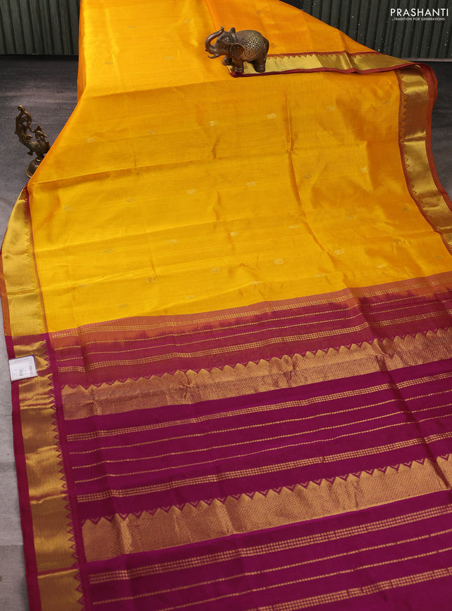 Silk cotton saree mango yellow and dark magenta pink with zari woven buttas and zari woven border