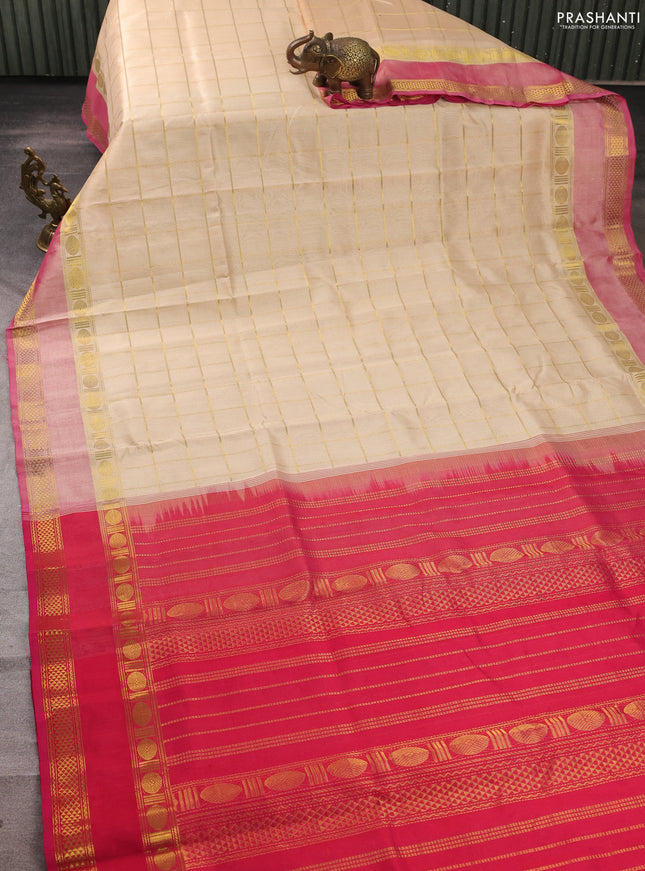 Silk cotton saree sandal and pink with allover zari checked pattern and rettapet zari woven border