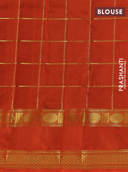 Silk cotton saree green and orange with allover zari checked pattern and rettapet zari woven border