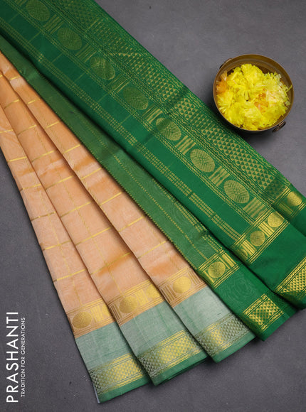 Silk cotton saree pale orange and green with allover zari checked pattern and rettapet zari woven border