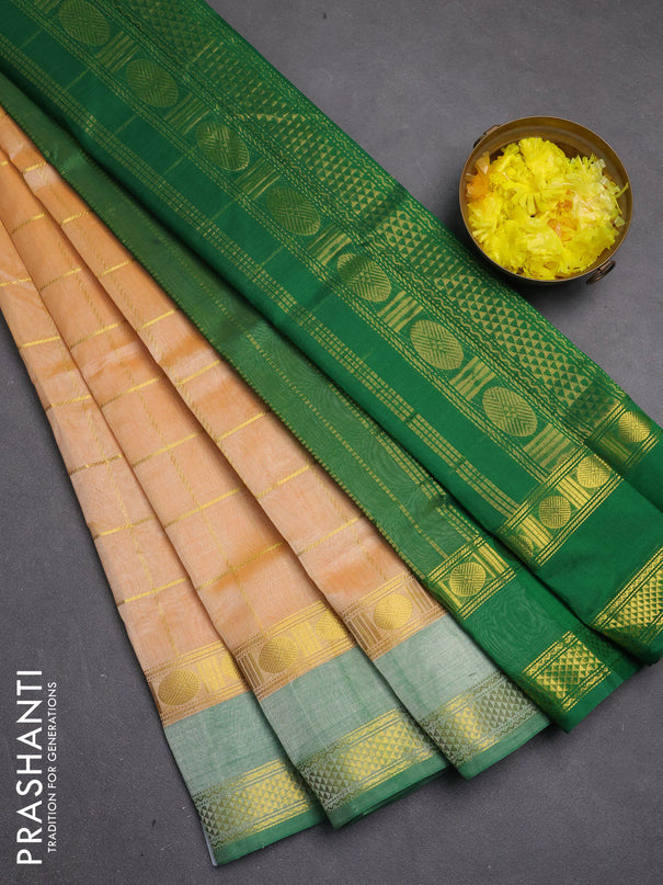 Silk cotton saree pale orange and green with allover zari checked pattern and rettapet zari woven border