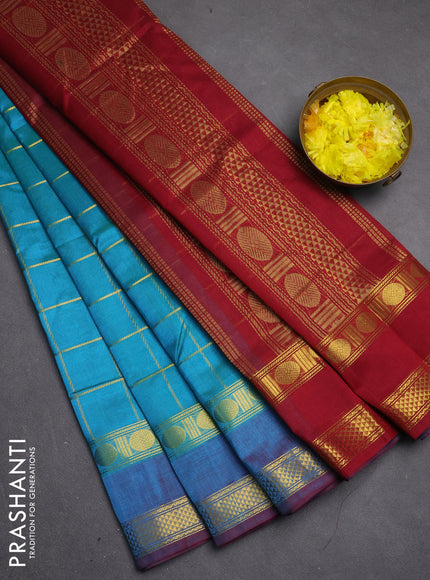 Silk cotton saree dual shade of teal bluish green and maroon with allover zari checked pattern and rettapet zari woven border