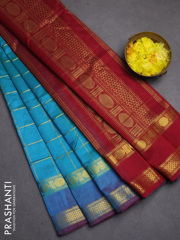 Silk cotton saree dual shade of teal bluish green and maroon with allover zari checked pattern and rettapet zari woven border