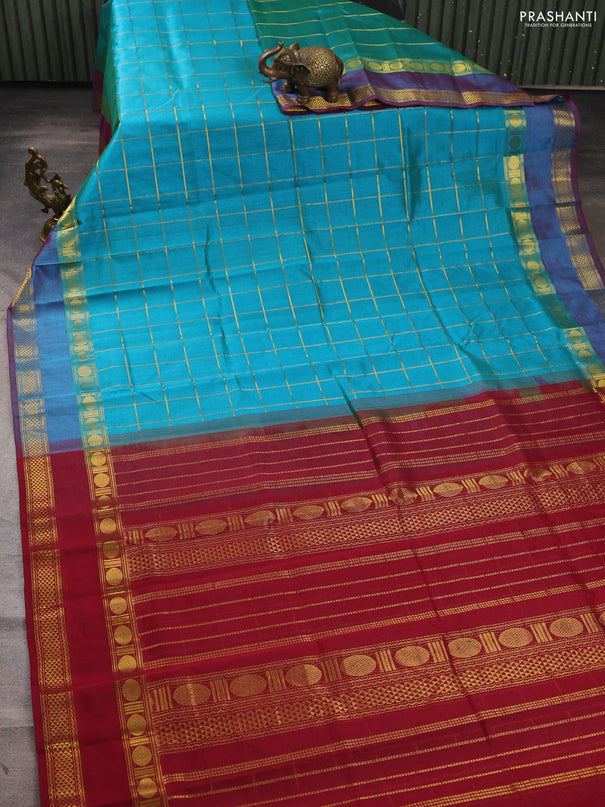 Silk cotton saree dual shade of teal bluish green and maroon with allover zari checked pattern and rettapet zari woven border