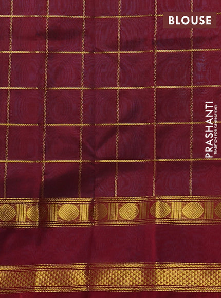 Silk cotton saree dual shade of teal bluish green and maroon with allover zari checked pattern and rettapet zari woven border
